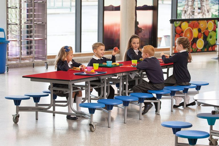 school dining furniture in use in school hall