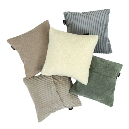 Set of five natural textured sensory cushions arranged in a classroom reading corner