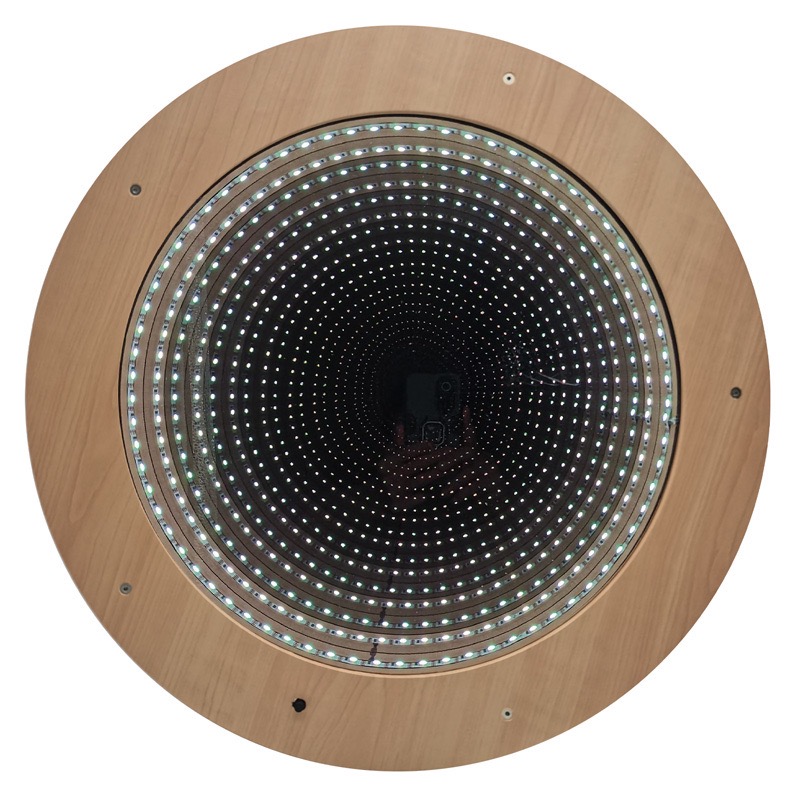 Infinity Mirror Tile with remote control creating an endless LED tunnel lighting effect for sensory rooms and SEND environments.