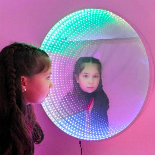 60cm Interactive Infinity Mirror with giant rechargeable buttons creating an endless LED tunnel effect for sensory rooms.